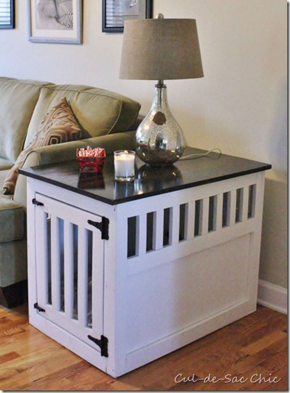 White vertical-slat pet crate styled as modern side table with black top