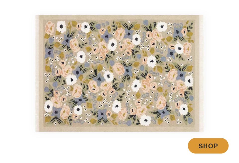 Neutral botanical wall art with white flowers and earthy sage tones