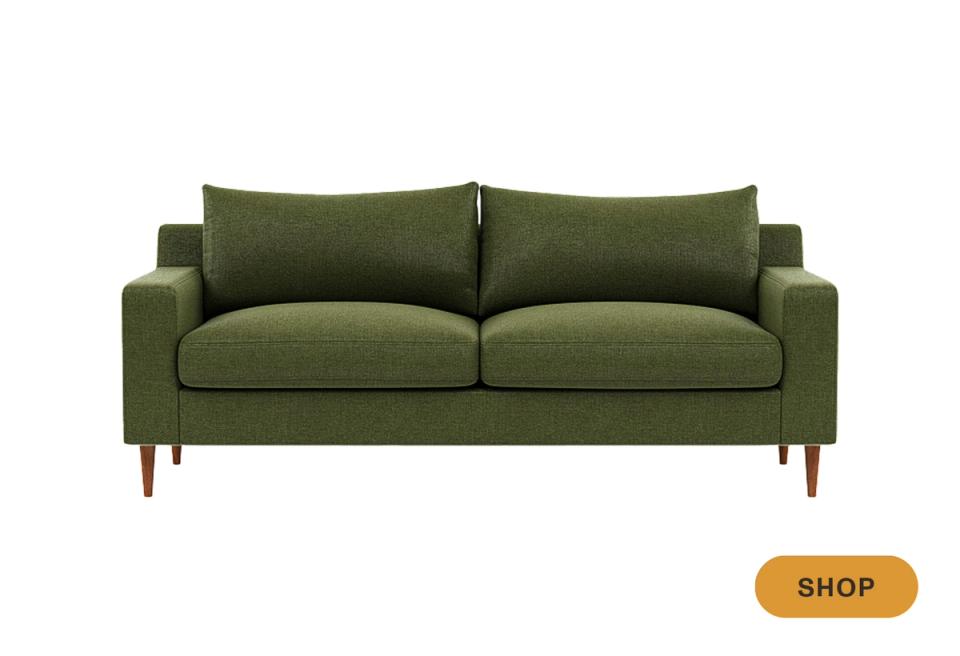 Mid-century modern olive-green sofa with wooden legs and clean-lined silhouette