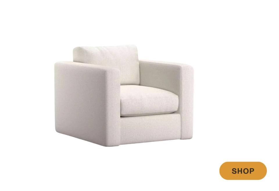 Transitional cream swivel armchair with streamlined, cubic form