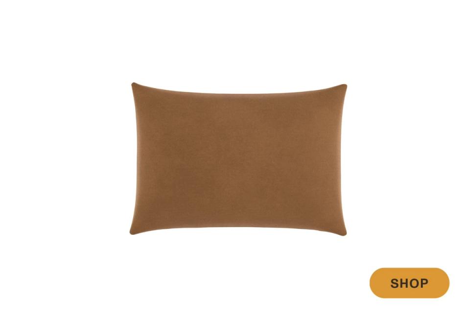 Caramel-toned rectangular throw pillow with soft texture