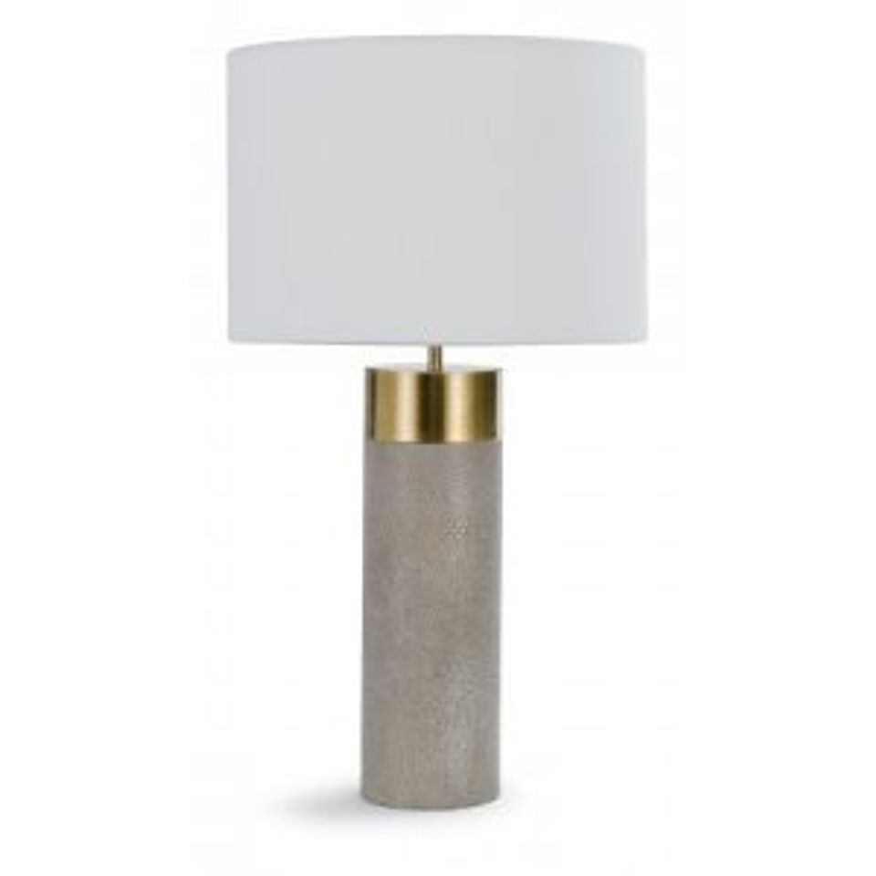 Modern table lamp with shagreen base, brass detail, and white linen shade