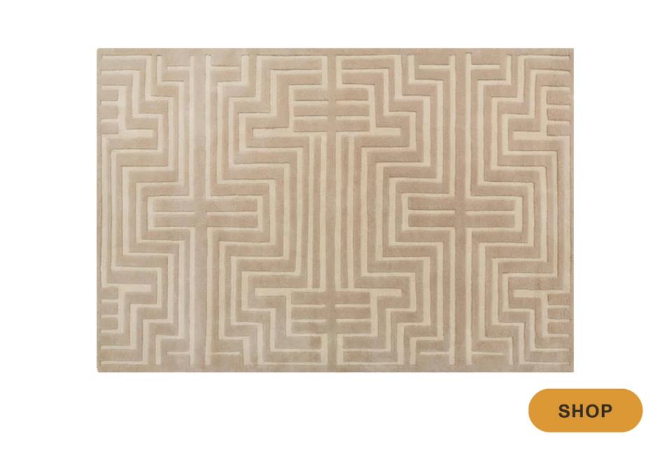 Contemporary tan and cream area rug with minimalist geometric Greek key pattern