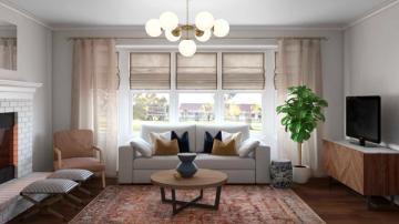 Warm mid-century modern living room with neutral sofa, layered textures, natural light, and earthy accent pillows