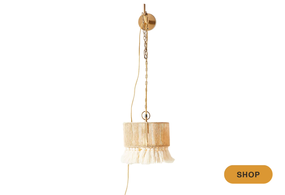 Boho pendant sconce with natural wood drum shade and delicate cream fringe detailing