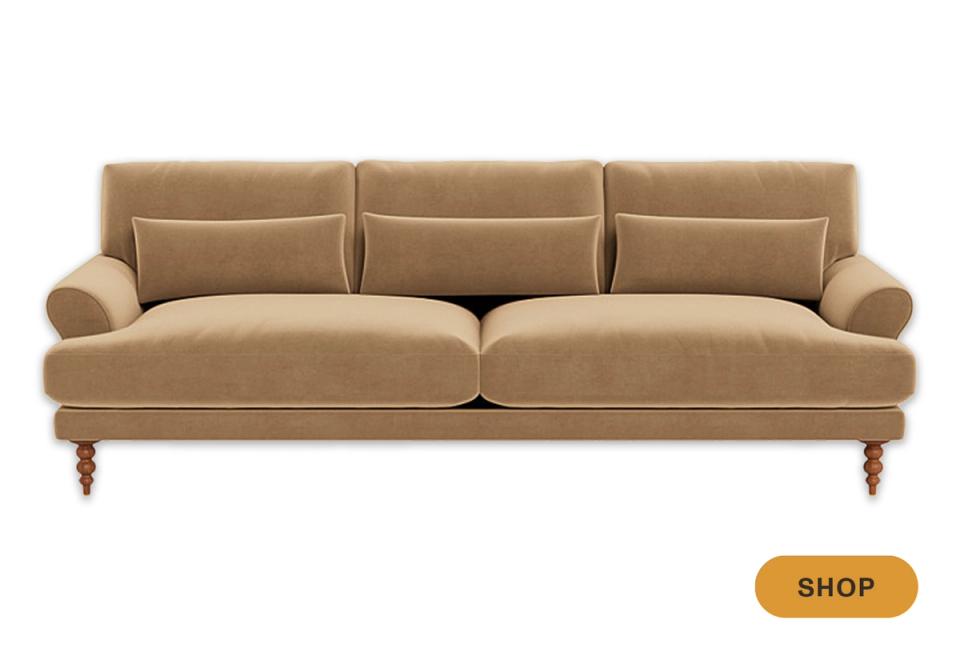 Classic camel sofa with rolled arms, nailhead trim, and traditional elegance