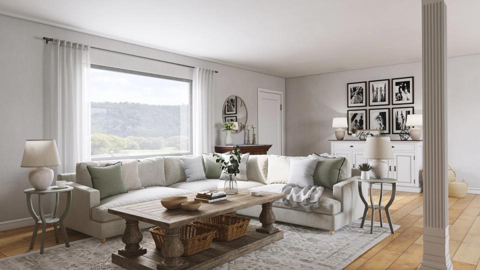 Transitional living room with sage green accents, rustic wood table, elegant neutrals
