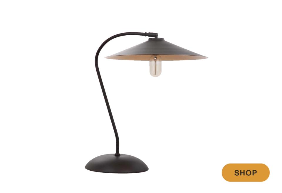 Mid-century arc lamp in black with sculptural curved stem and metallic shade