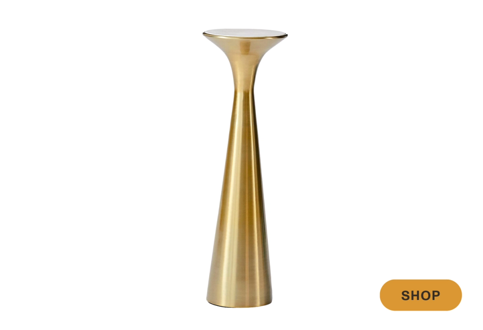 Sleek brass cone-shaped martini table with tapered silhouette and metallic finish