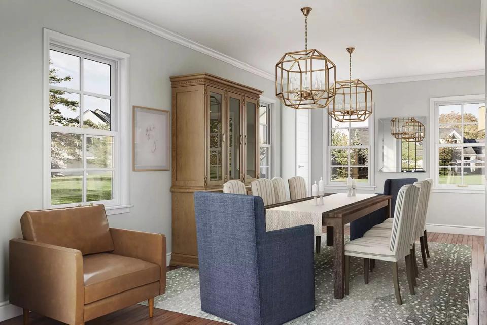 Sophisticated coastal dining with navy island, leather seating, brass fixtures, and soft neutrals