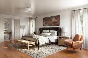 Sophisticated master bedroom blends mid-century modern furniture with warm wood and neutral palette