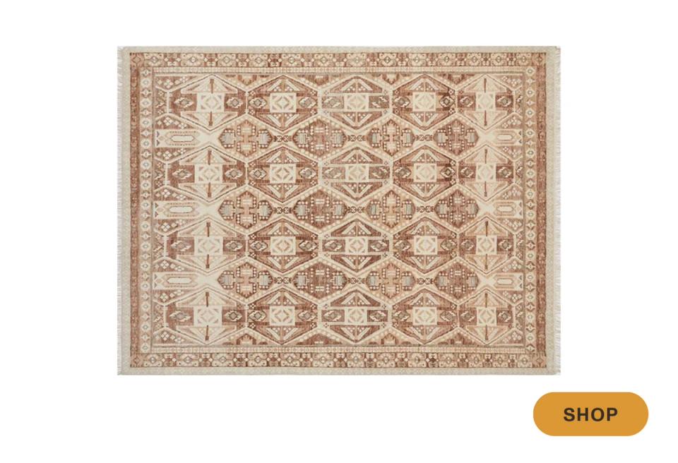 Traditional cream and taupe area rug with ornate geometric medallion pattern and border