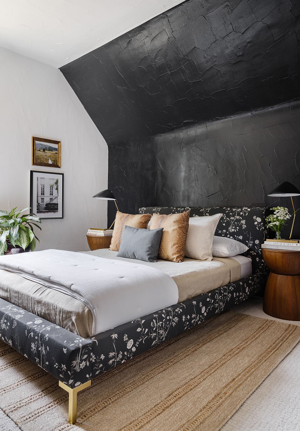 Mid-century modern bedroom blending charcoal geometric patterns with warm wood tones and cream accents
