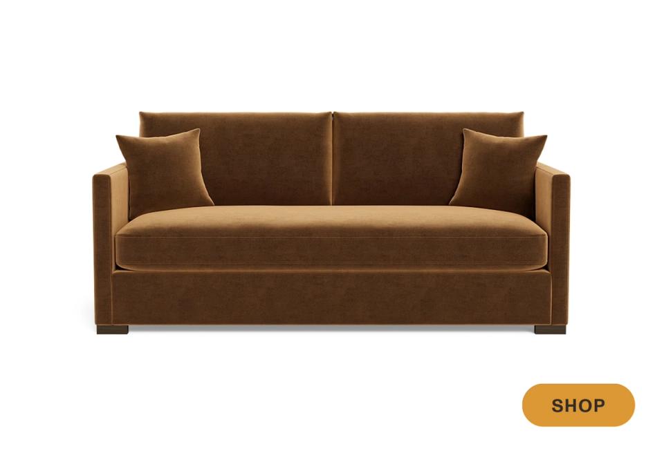 Luxe caramel leather sofa with nailhead trim and contemporary elegant aesthetic