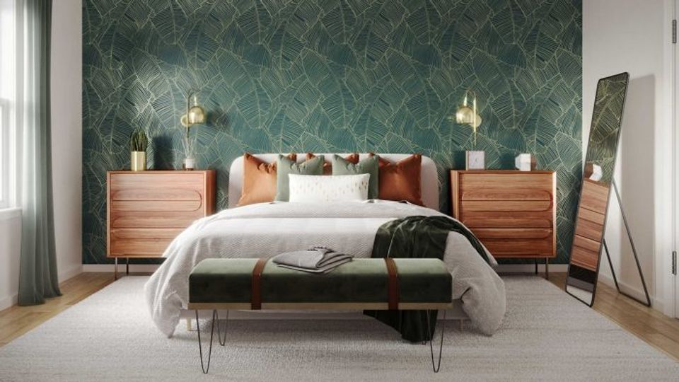 Mid-century modern bedroom with teal damask accent wall, warm wood nightstands, and brass pendant lighting