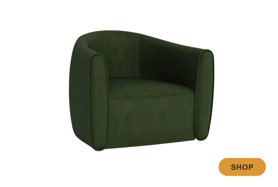 Modern deep forest green swivel chair with plush rounded form