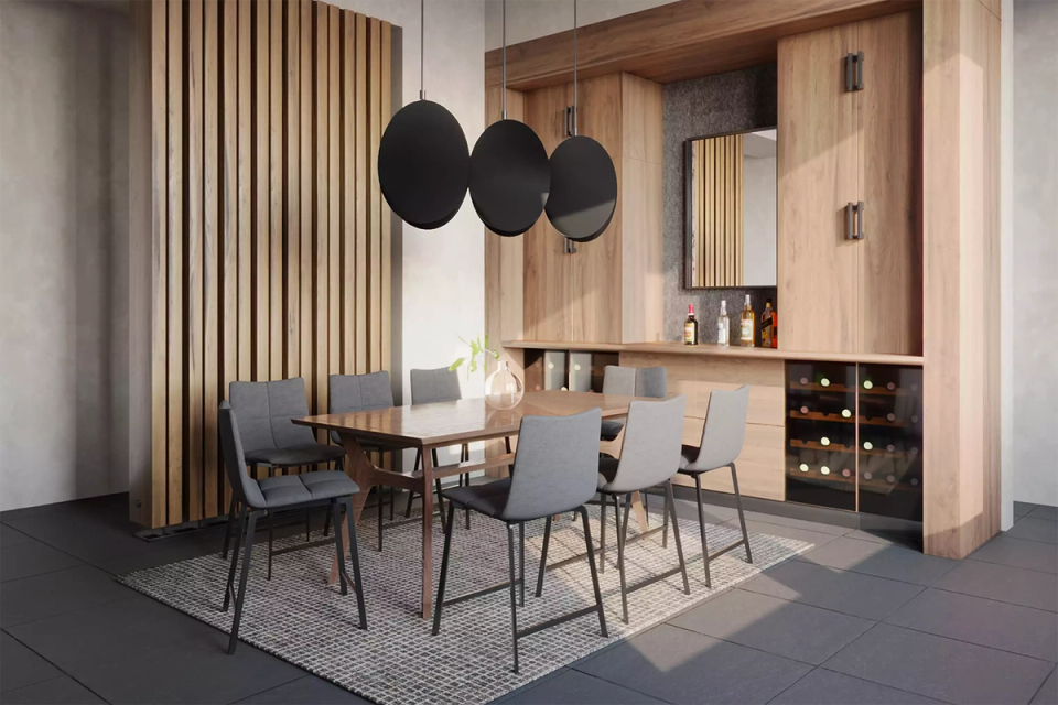 Warm minimalist dining area with wood accents, geometric pendant lights, and built-in storage