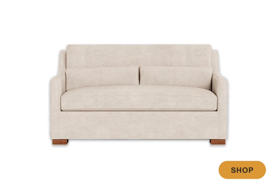 Minimalist beige linen sofa with clean lines and wood block feet