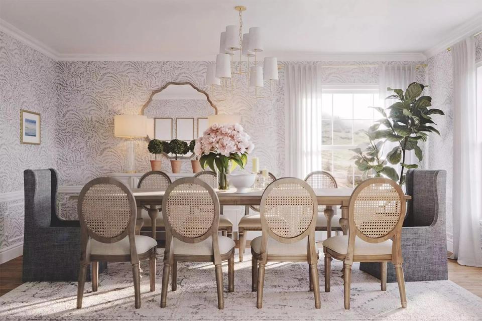 Elegant dining room with lavender walls, caned chairs, and soft candlelit ambiance