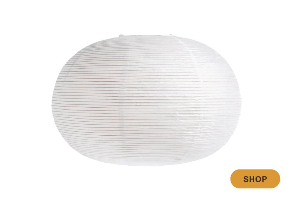 Soft white oval rice paper pendant creating diffused, ambient lighting