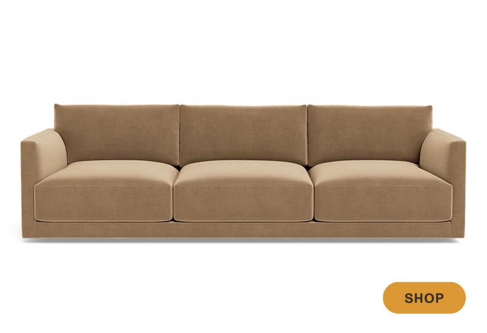 Streamlined camel linen sofa with clean lines and understated modern elegance