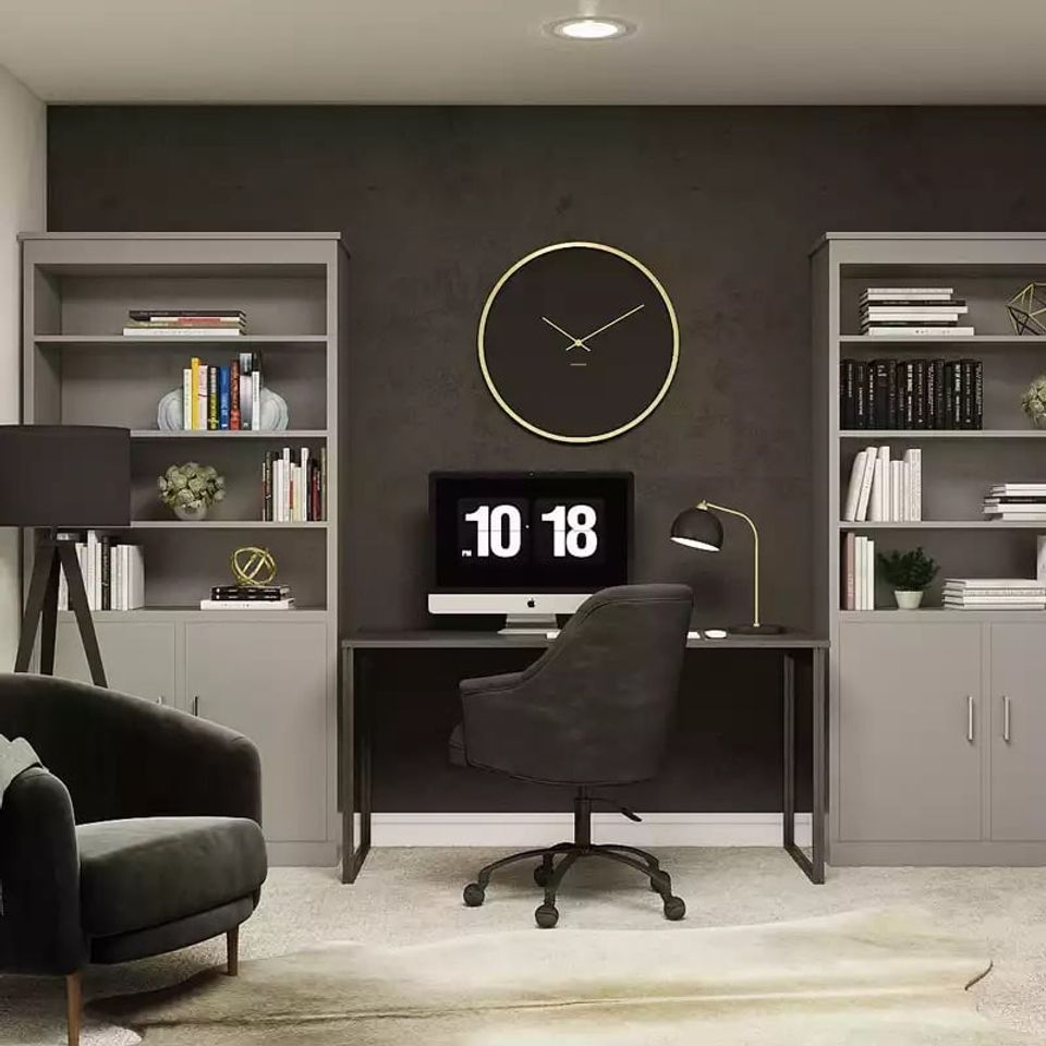 Minimalist home office with dark charcoal wall, white shelving, brass clock, and sleek furniture creating serene, focused work environment