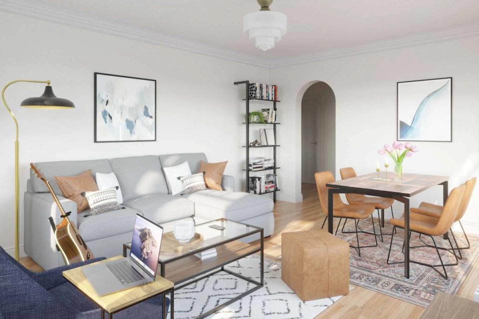 Scandinavian studio with light wood furnishings, soft blue accents, airy minimalist feel