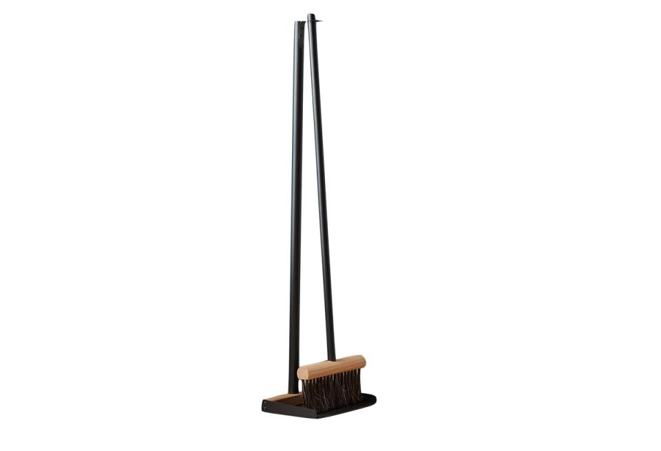 Scandinavian-inspired brush and dustpan set in natural wood and black metal