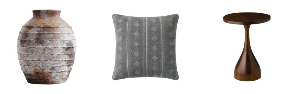 Southwestern home accessories: textured pottery, geometric pillow, and wooden accent table