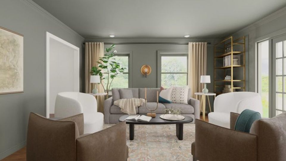 Sophisticated sage green living room with warm brown leather seating and brass accents balancing cool and warm tones elegantly