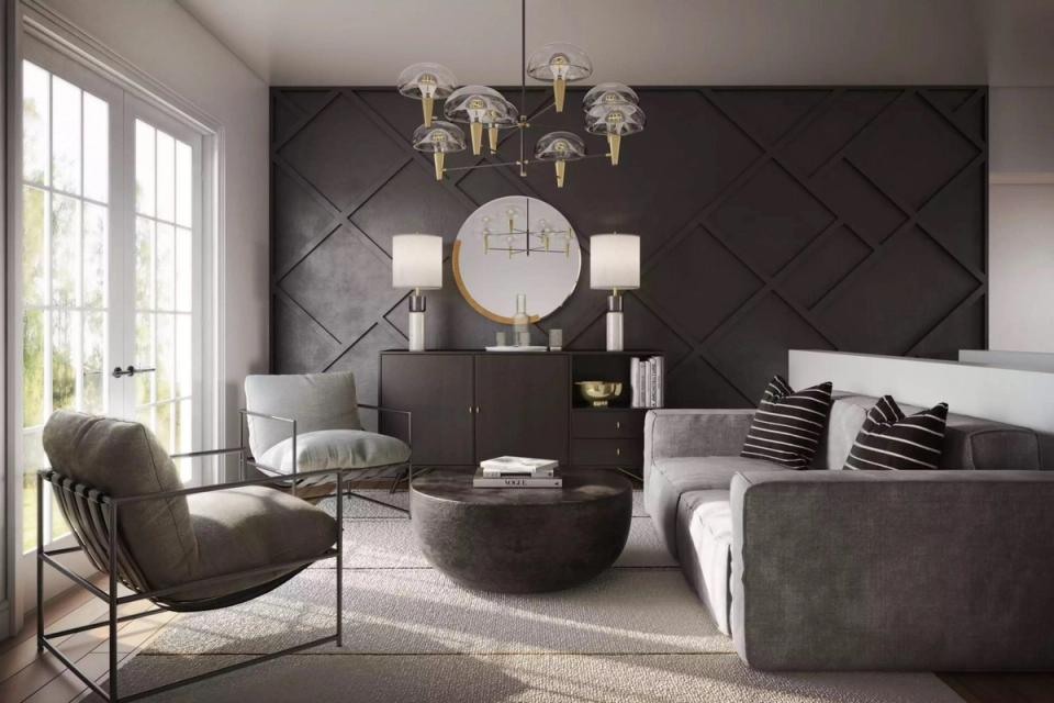 Dramatic modern living room with deep charcoal walls, geometric accent wall, and contrasting light upholstery creating moody sophistication.