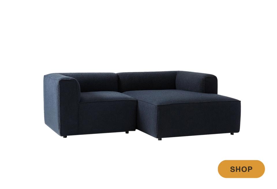 Modern compact dark navy sectional with sleek lines and space-saving configuration
