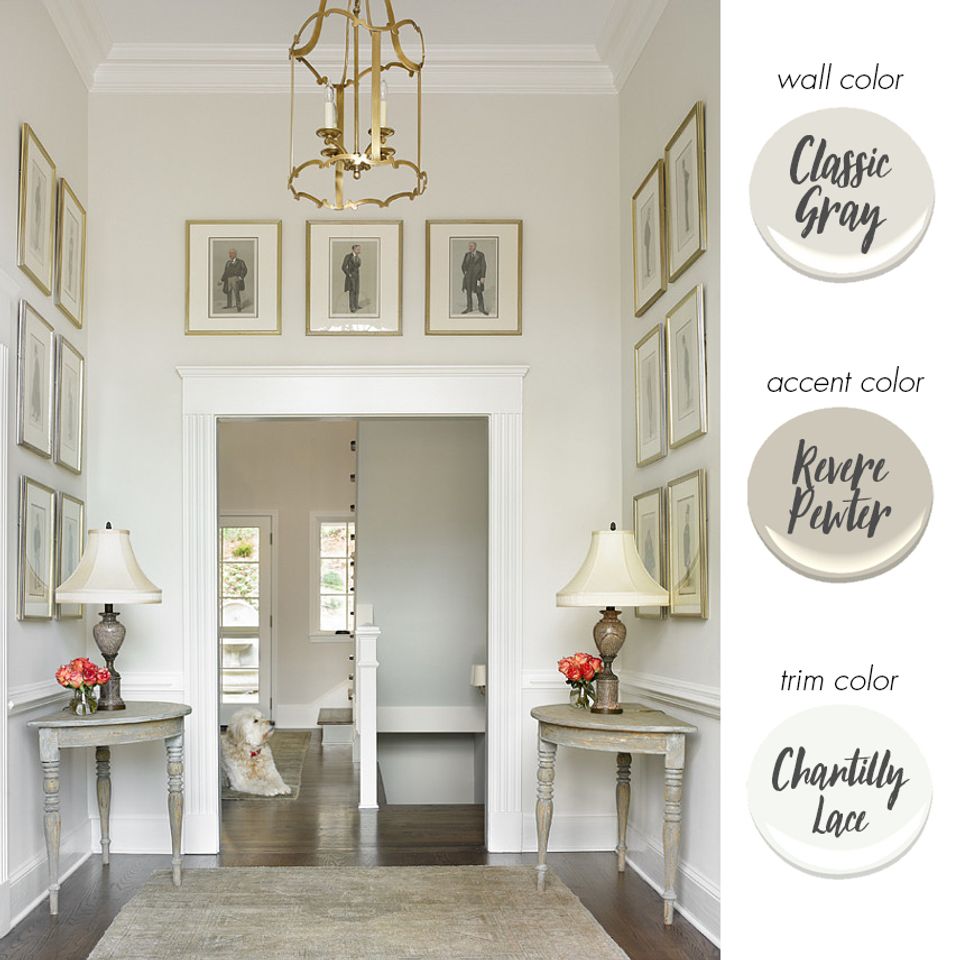 Classic entryway with soft gray walls, elegant symmetry, and timeless sophistication