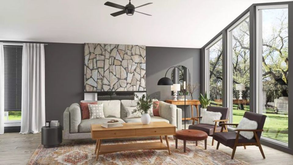 Mid-century modern living room with charcoal walls, neutral sofa, natural wood tables, and large glass doors
