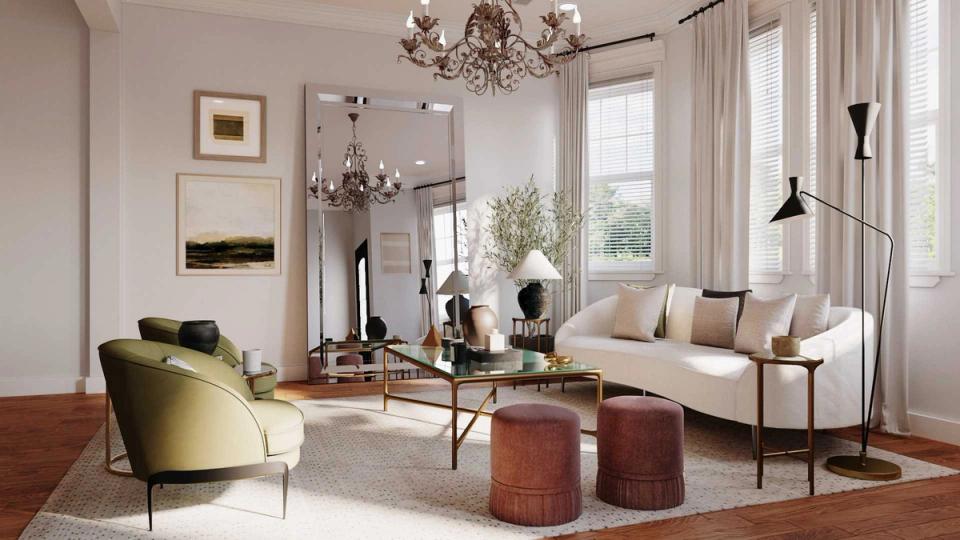Luxe modern living room with cream sofa, brass chandelier, and warm terracotta accents