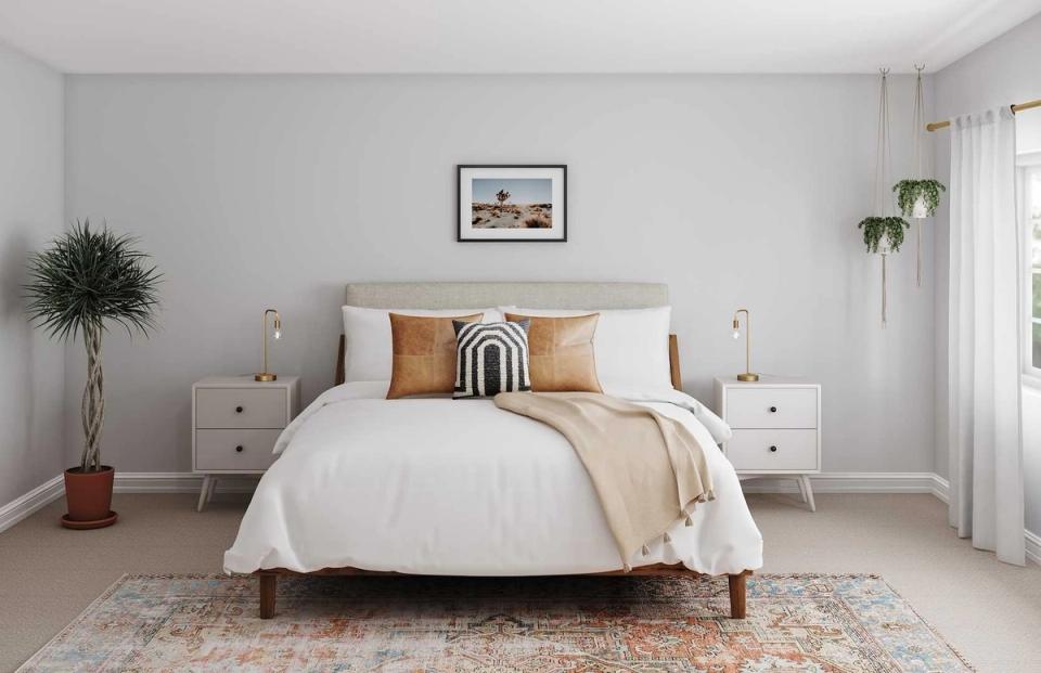 Serene modern bedroom with neutral palette, clean lines, warm wood frame, and layered textures creating a calming oasis.