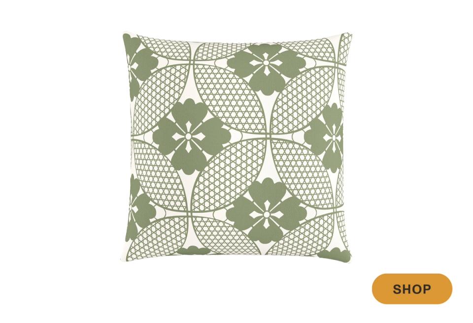Sage green and cream pillow with geometric quatrefoil and lattice design