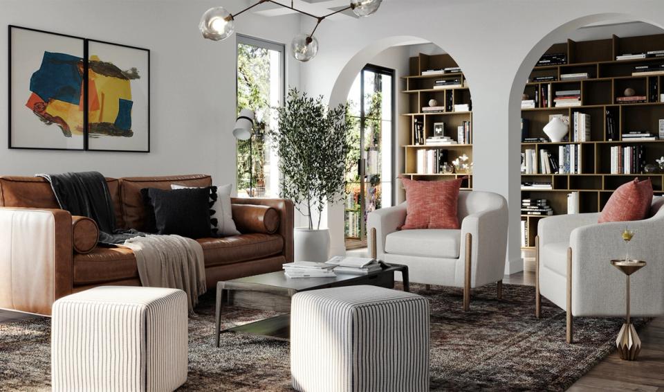 Eclectic transitional living room blending warm chocolate leather with crisp white seating, terracotta accents, and arched architectural details