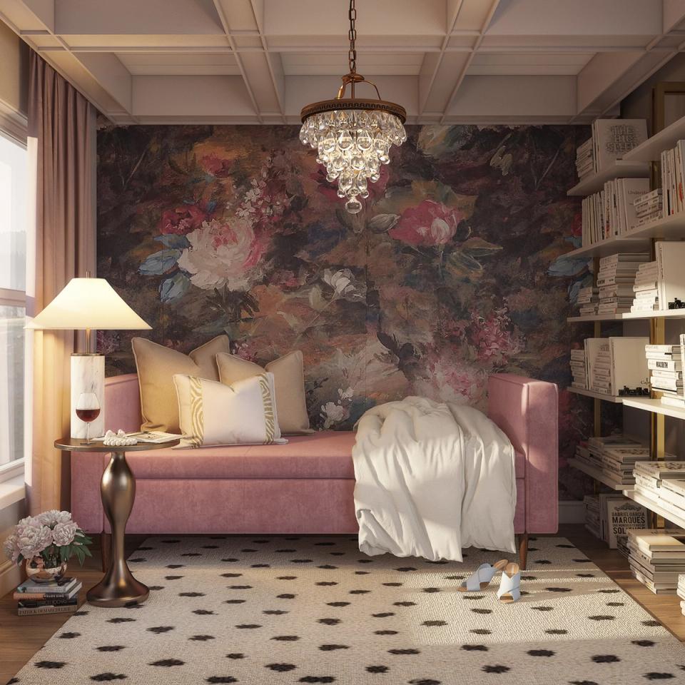 Romantic moody reading retreat with dark floral wallpaper, mauve velvet seating, crystal chandelier, and gilt details.