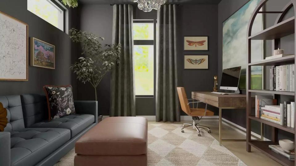 Eclectic dark academia room with slate walls, floral wallpaper accent, green velvet seating, vintage charm