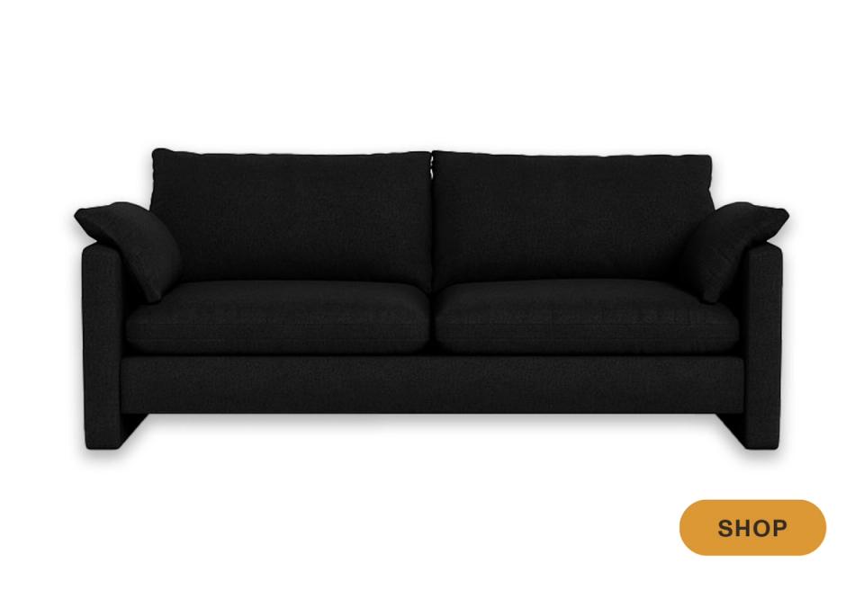 Modern black sofa with bold geometric arms and contemporary minimalist styling