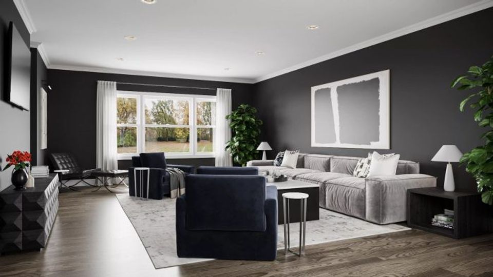 Sophisticated gray living room with black accent wall, modern furniture, and greenery for contemporary calm