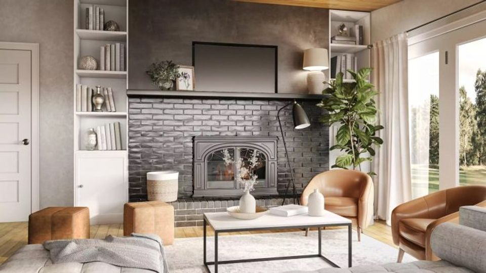 Mid-century modern living room with charcoal brick accent wall, warm caramel leather chairs, and light wood shelving creating an inviting, balanced aesthetic.