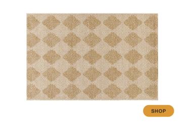 Transitional diamond patterned rug in warm beige and cream tones