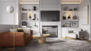 Minimalist living room with cognac leather sofa, white shelving, and geometric floor lamp