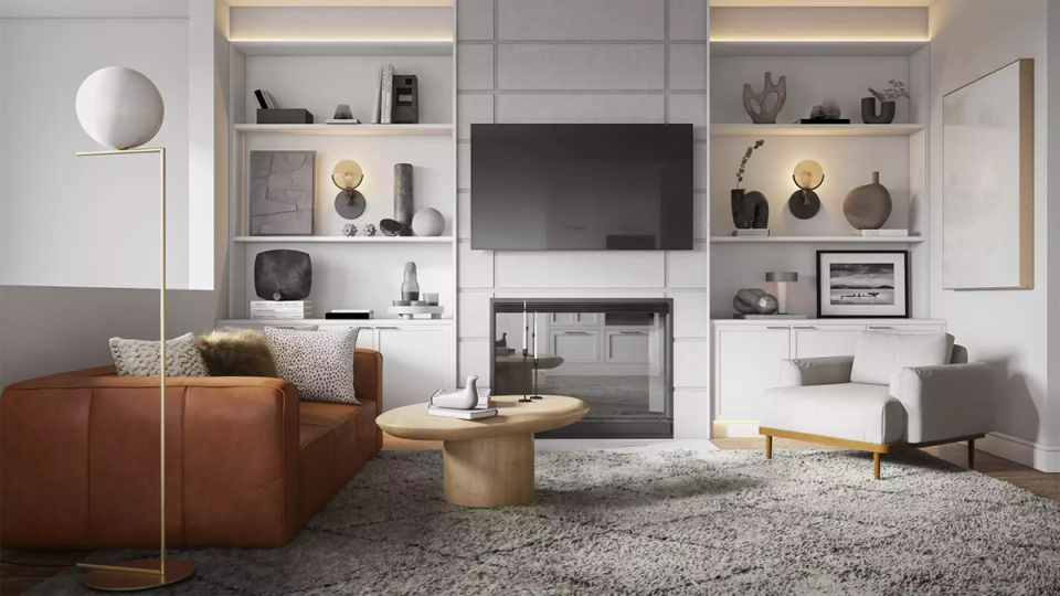 Minimalist living room with cognac leather sofa, white shelving, and geometric floor lamp