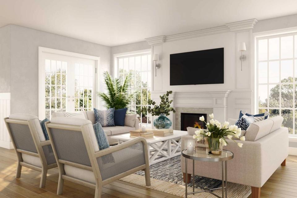 Bright transitional living room with blue accents, fireplace focal point, and airy coastal feel