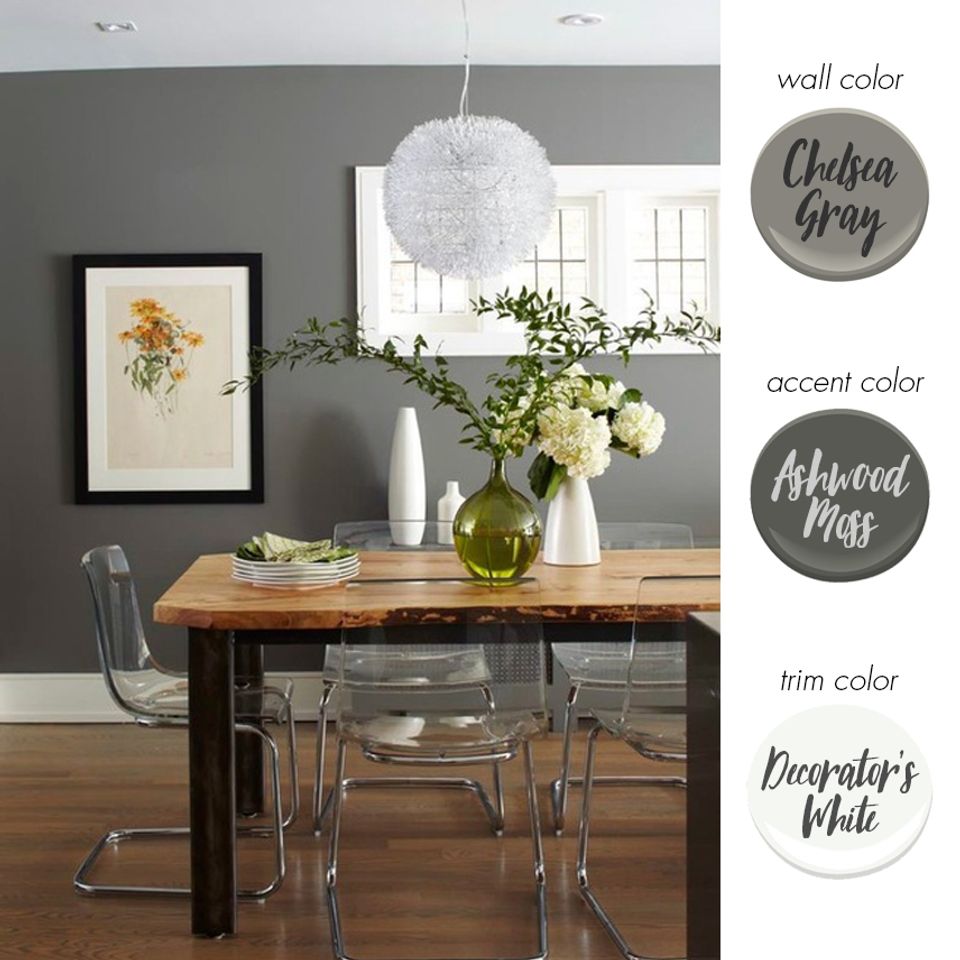 Modern dining space with cool gray tones, botanical accents, and clean minimalism