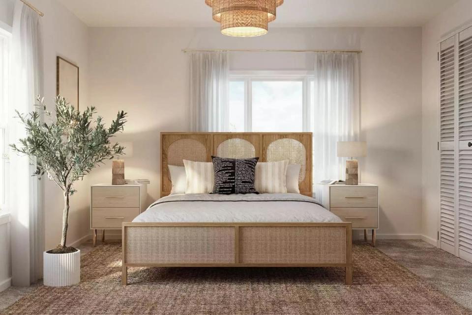 Coastal bedroom with rattan cane headboard, woven pendant light, and soft neutral beach palette