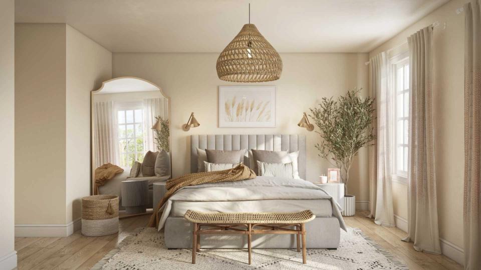 Serene bedroom with soft greige tones, woven pendant light, and natural textiles creating calm elegance.